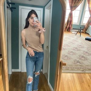 Cream colored shoulder cutout sweater from superdown/revolve.